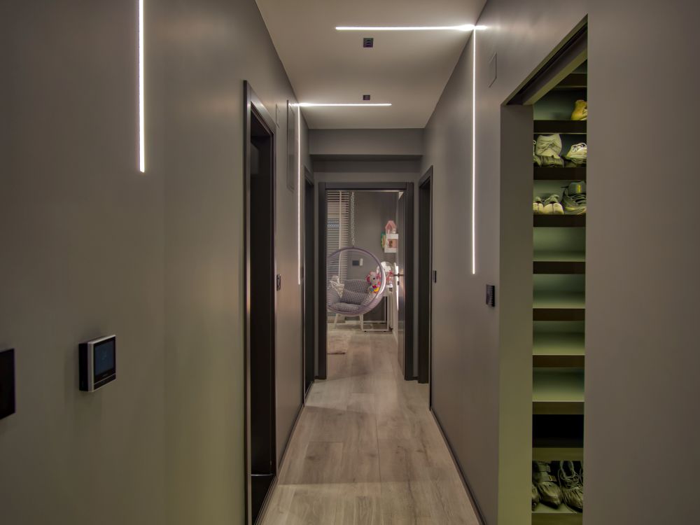 The soft grey tones are quite prominent on the hallway that connects all the rooms